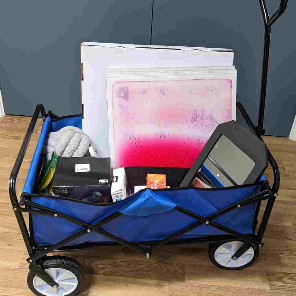 Blue trolley with various pieces of sensory equipment stored inside